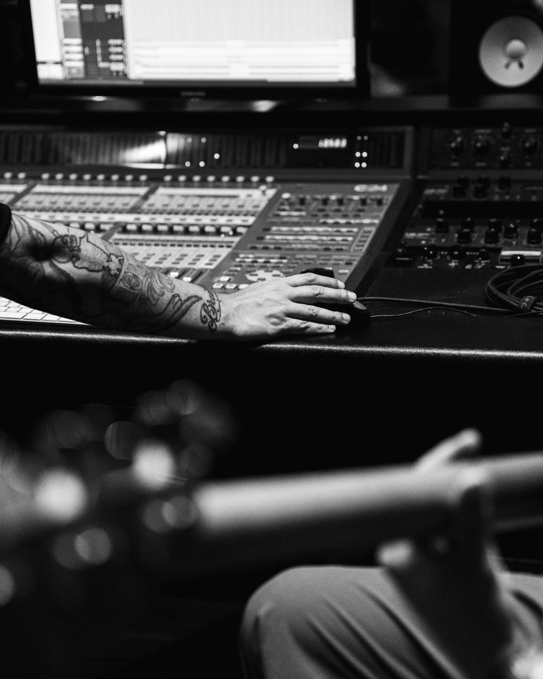 Imran Siddiqi working at the mixing console