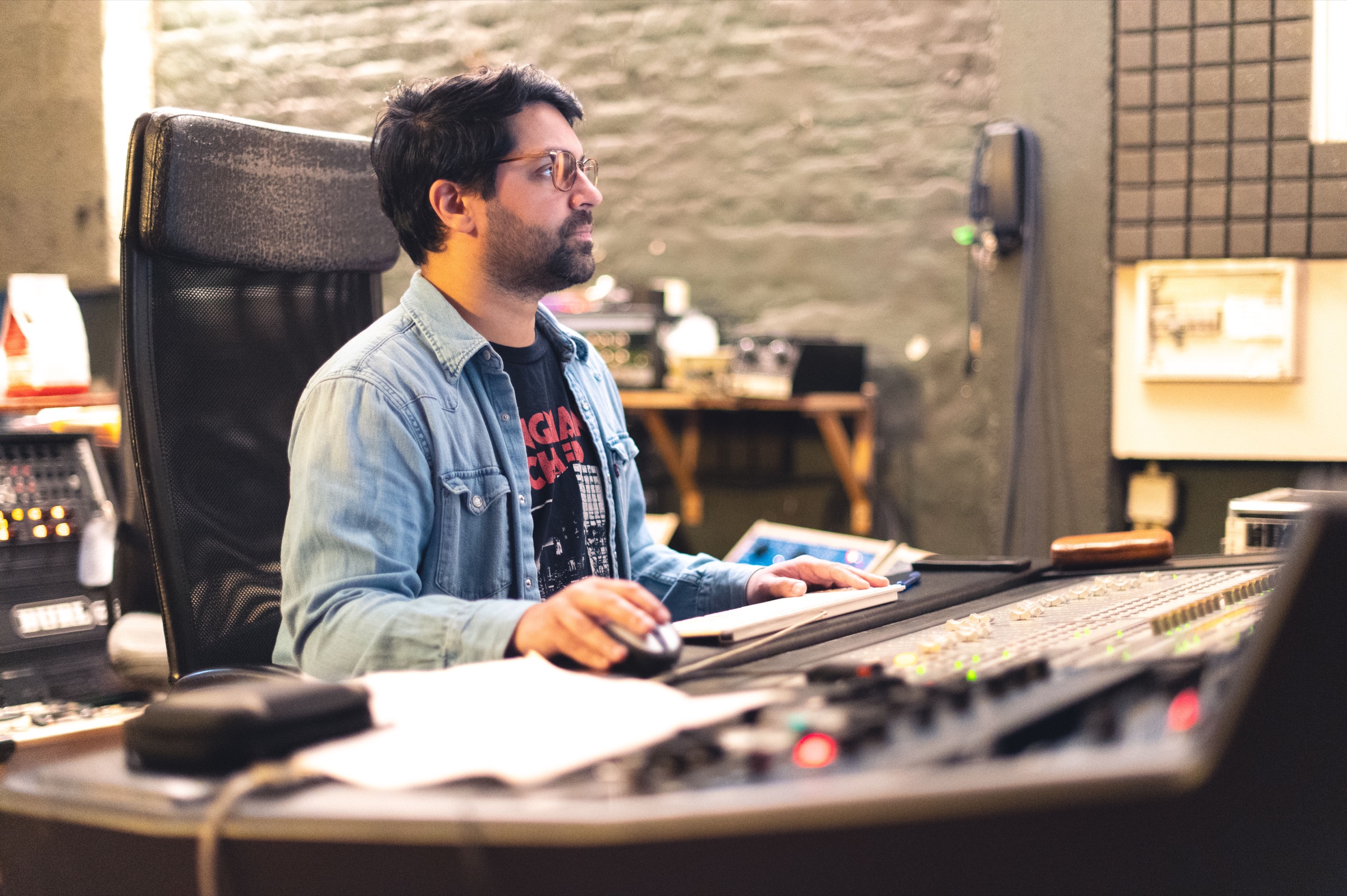 Imran Siddiqi working at the mixing console in Studio Six